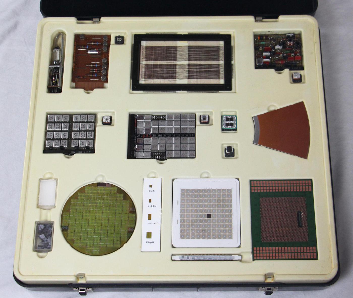 An IBM display box, showing components and board from different generations of computing. Click this (or any other photo) for a larger image.