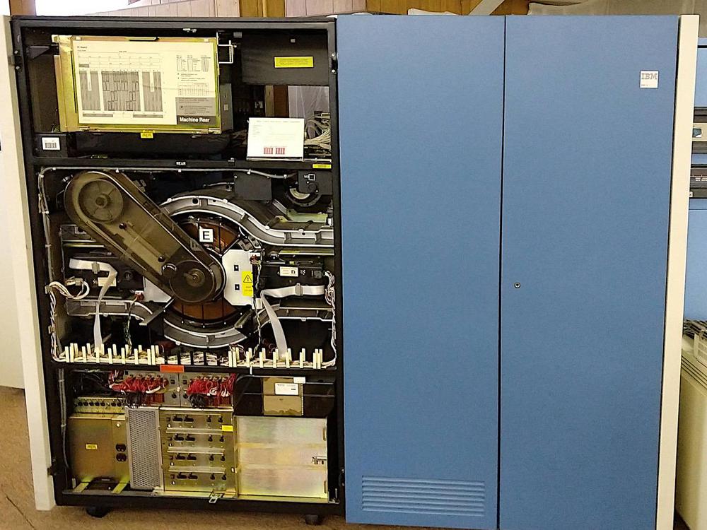 An IBM 3380E disk storage system, holding 5 gigabytes. The disk platters are center-left, labeled "E". Photo taken at the Large Scale Systems Museum.