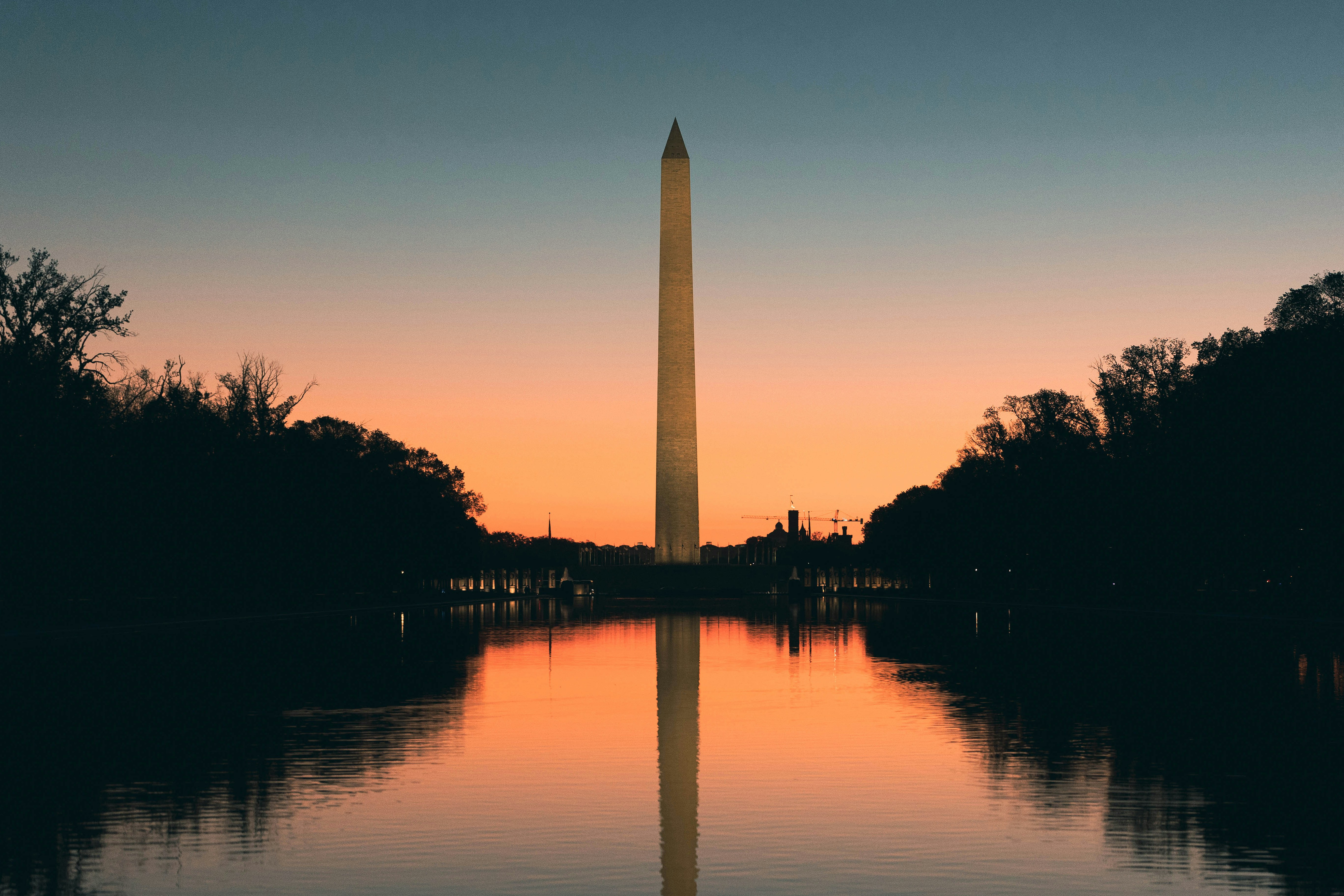 the washington monument in washington dc at sunset